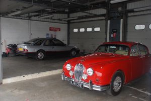 Mk2 and XR4i in garage